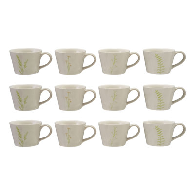 Tasses en grès gravé avec motifs botaniques dans un glacis réactif
