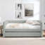 Lit de jour simple rembourré avec couchette escamotable, port de chargement USB et poches de rangement latérales pour une vie moderne.-2139176581