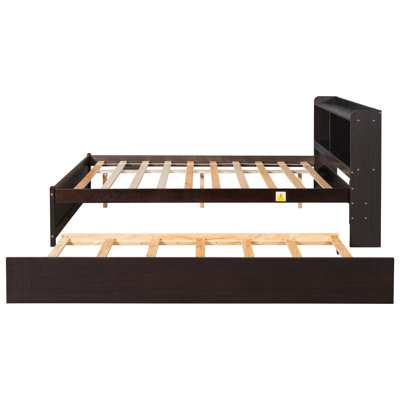 Lit avec lit gigogne et tête de lit bibliothèque, parfait pour les petites chambres et pour optimiser l'espace