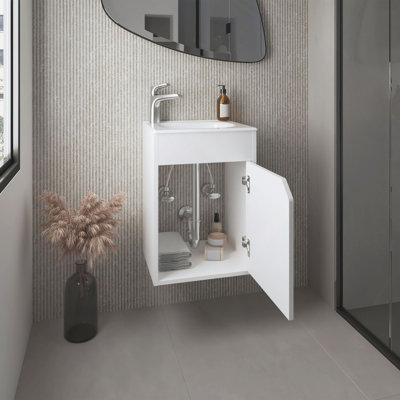 Meuble-lavabo flottant à une porte avec lavabo en résine et deux tablettes, rangement pour salle de bain