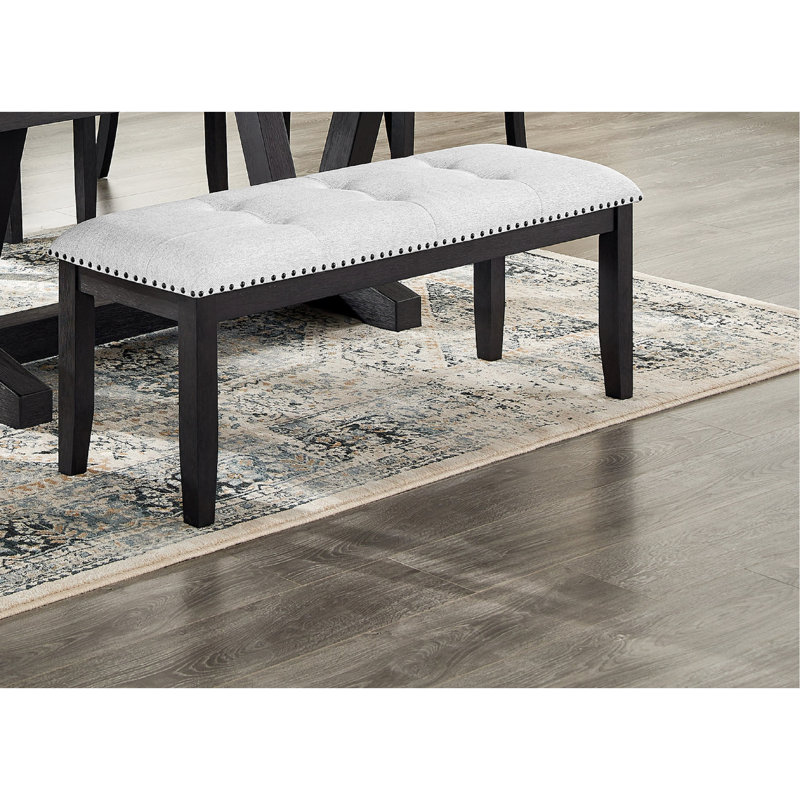Banc rembourré confortable avec pieds noirs et revêtement gris pour salle à manger élégante en gris