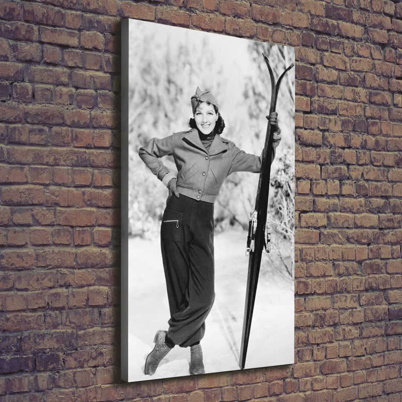 Woman With Skis - Wrapped Canvas Print