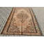 Tapis turc rétro avec des motifs orientaux élégants aux tons de terre pour un design décoratif traditionnel dans une grande surface