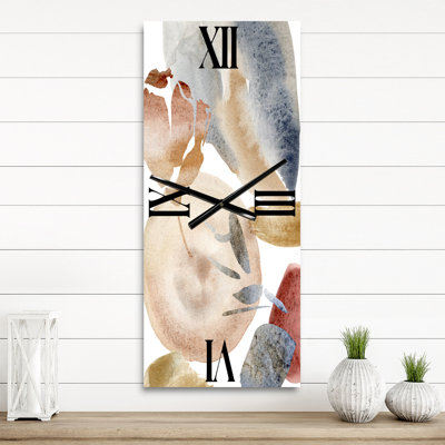 Horloge murale abstraite avec taches pastel
