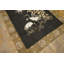 Tapis noué à motif floral antique