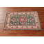 Tapis décoratif vert Kazak