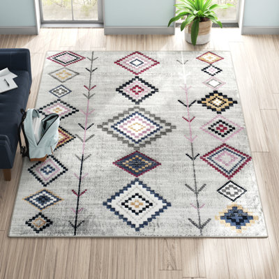 Tapis gris à motif tribal autochtone Spurgeon