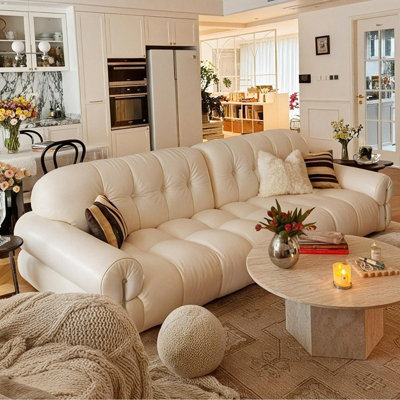 Coussin beige modulaire en similicuir