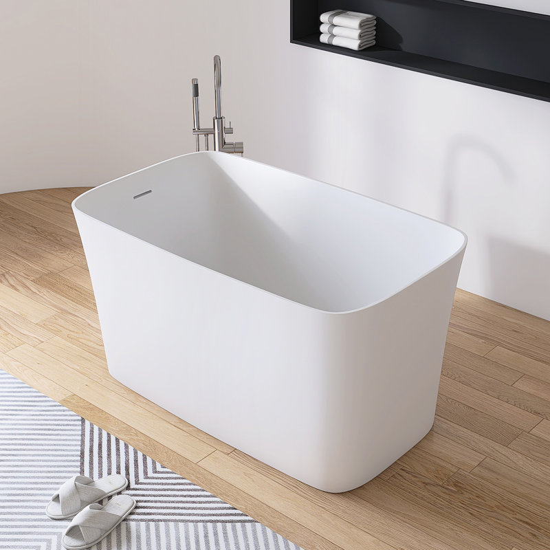 Baignoire autoportante de 47 po x 28 po à surface solide avec siège