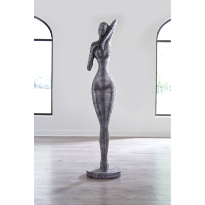 Statue admirative debout, aluminium