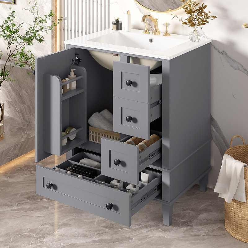 Meuble-lavabo de 24 pouces avec lavabo intégré en céramique, tablette à double couche, tiroirs à fermeture en douceur et porte d'armoire à fermeture en douceur.