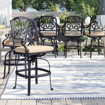 Lebanon Swivel 26" Patio Bar Stool with Cushion by Three Posts