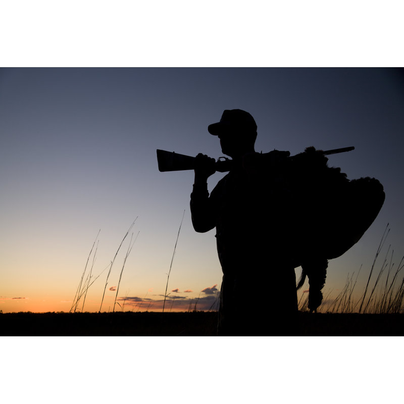 Silhouette d'un chasseur au coucher du soleil par Jonhuelskamp, H 8 po x l 12 po