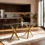 Grande table de salle à manger rectangulaire en verre avec plateau trempé épais et pieds en métal doré de luxe