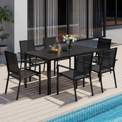 Ensemble de table de salle à manger d'extérieur 7 pièces avec 6 fauteuils empilables revêtus de polyester enduit de PVC-b