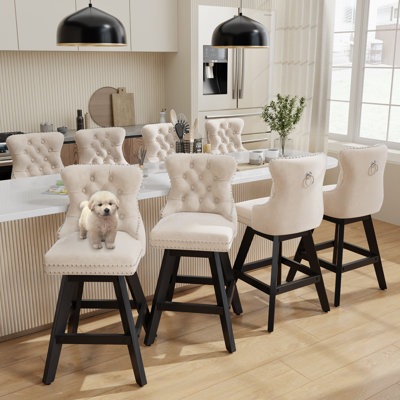 Ensemble de 8 tabourets de bar en bois touffeté et pivotant en velours