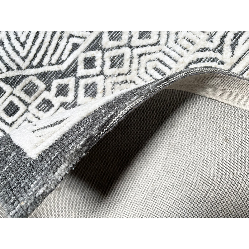 Tapis géométrique en laine touffeté à motif géométrique gris / noir / blanc 5 pi 3 po x 7 pi 6 po