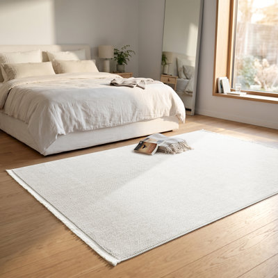 Tapis texturé à franges