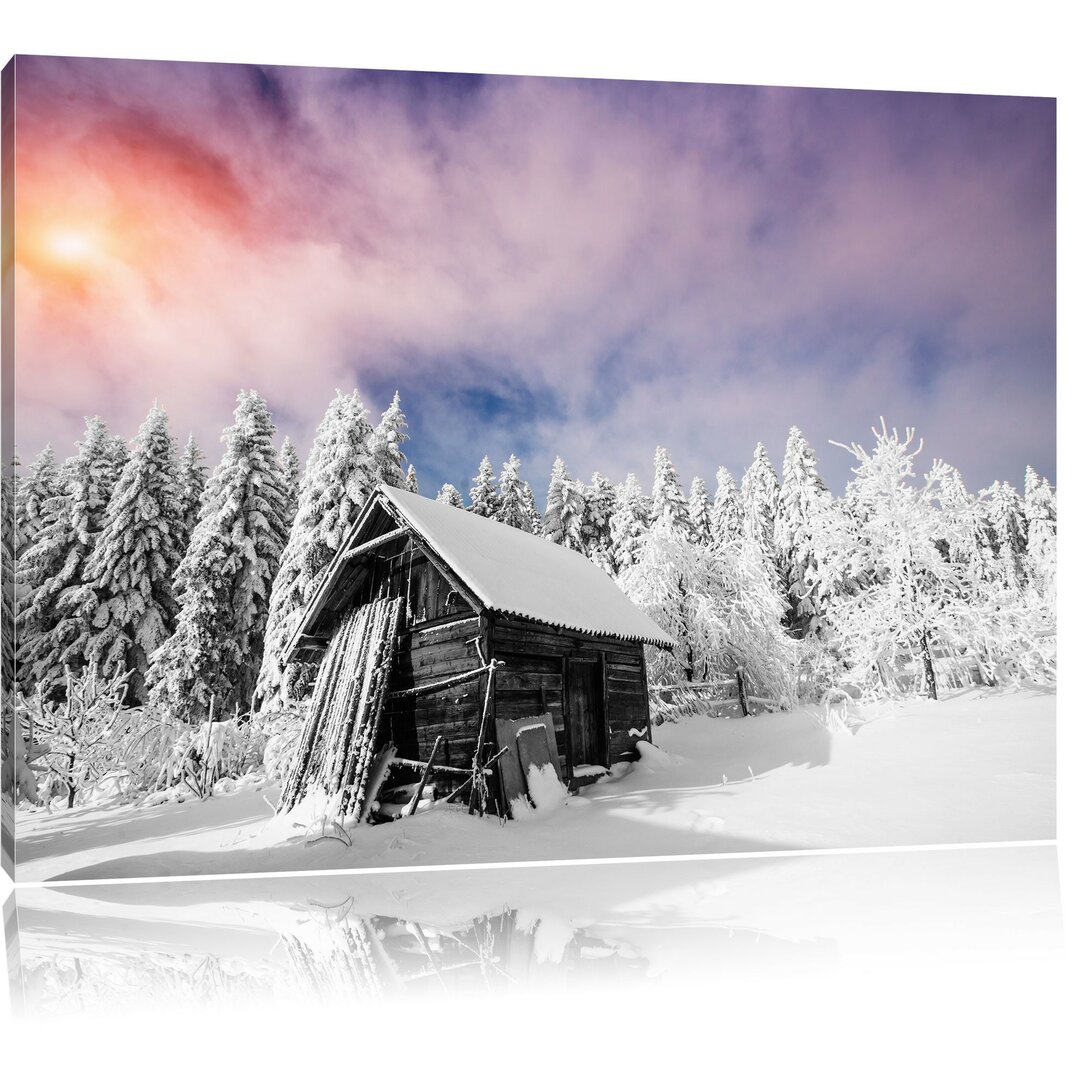 Leinwandbild Holzhütte im Schnee