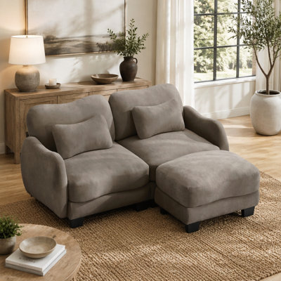 Causeuse en L avec repose-pieds