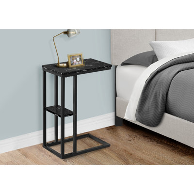 Table à collation avec surface semblable au marbre noir et base en métal pour une apparence de marbre
