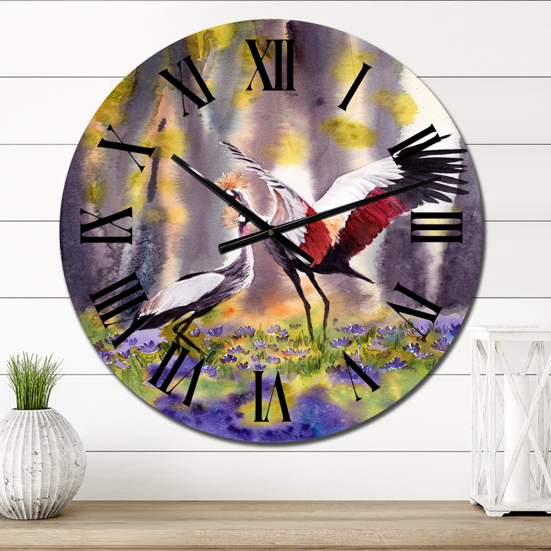 Deux grues couronnées dansant dans une clairière ensoleillée - Horloge murale traditionnelle, Petit