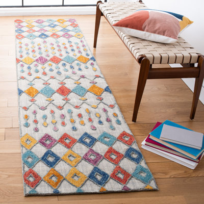 Tapis géométrique en laine / coton touffeté à la main bleu clair / jaune / rouge