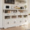 Buffet Farmhouse avec portes de grange et tablettes réglables | Grand buffet de rangement de cuisine avec 4 espaces ouverts, 2 tiroirs, noir