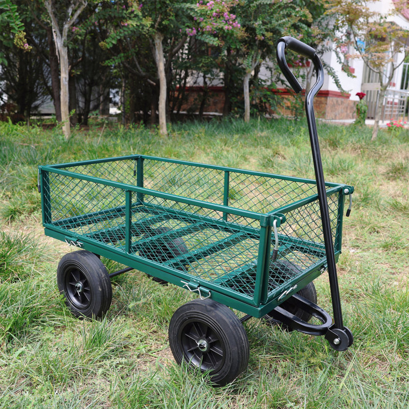 Les chariots de chariot de jardin avec outils solides de roues facilitent le transport du bois de chauffage