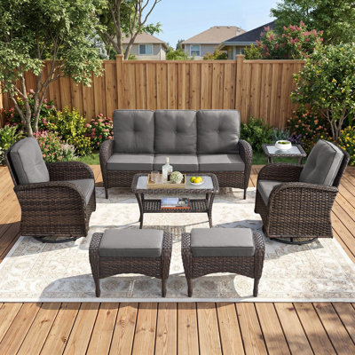 Ensemble de conversation de patio extérieur en osier 7 pièces avec des chaises pivotantes et des poufs