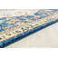 Tapis bleu à motif médaillon-26647254