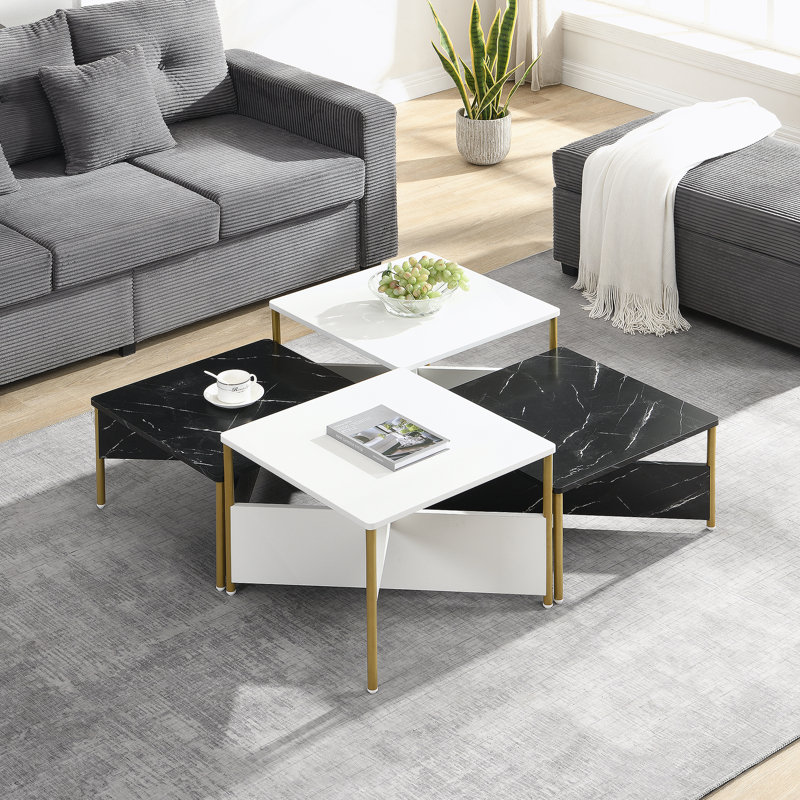 Ensemble de quatre tables gigognes polyvalentes et modernes, adaptables à différentes configurations, idéales pour le décor et la fonctionnalité du salon