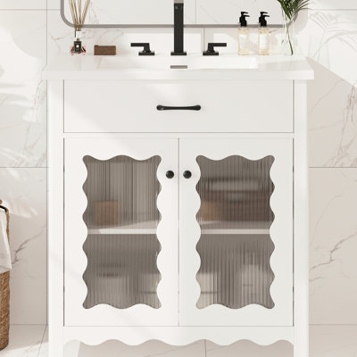 Meuble-lavabo de 79 cm (31 po) avec verre trempé, tablettes réglables et profil incurvé pour une ambiance relaxante. Portes à fermeture en douceur et lavabo en céramique.