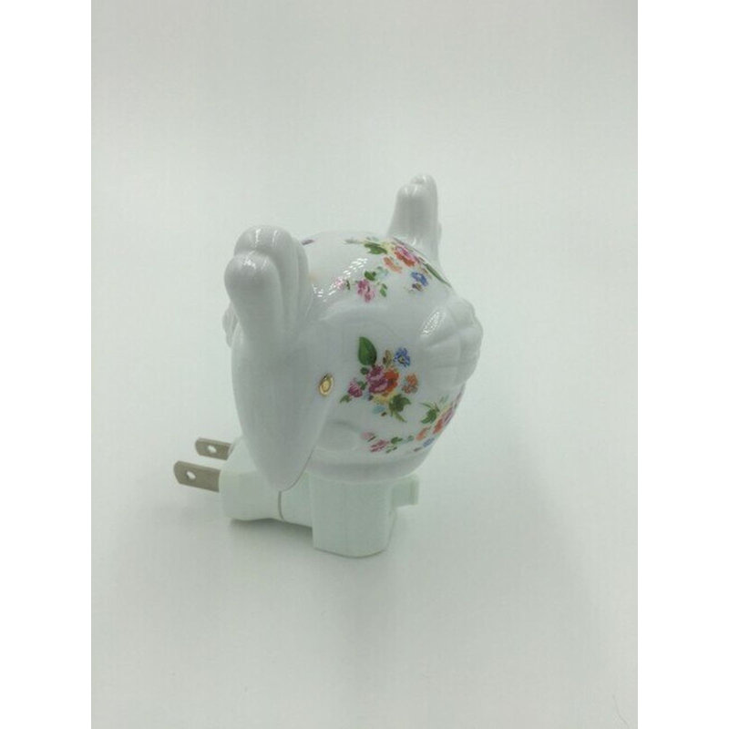 Veilleuse florale en forme de coq