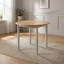 Deerfiled Extendable Round Solid Wood Dining Table