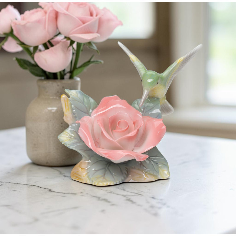 Figurine colibri avec rose de la paix