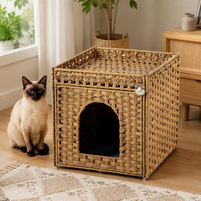 Natural PE rattan conceals the litter box inside this kitty-house enclosure, which includes a top fence, litter mat, 2 S-Hooks, and sturdy metal frame and is sized to fit a standard litter box.
