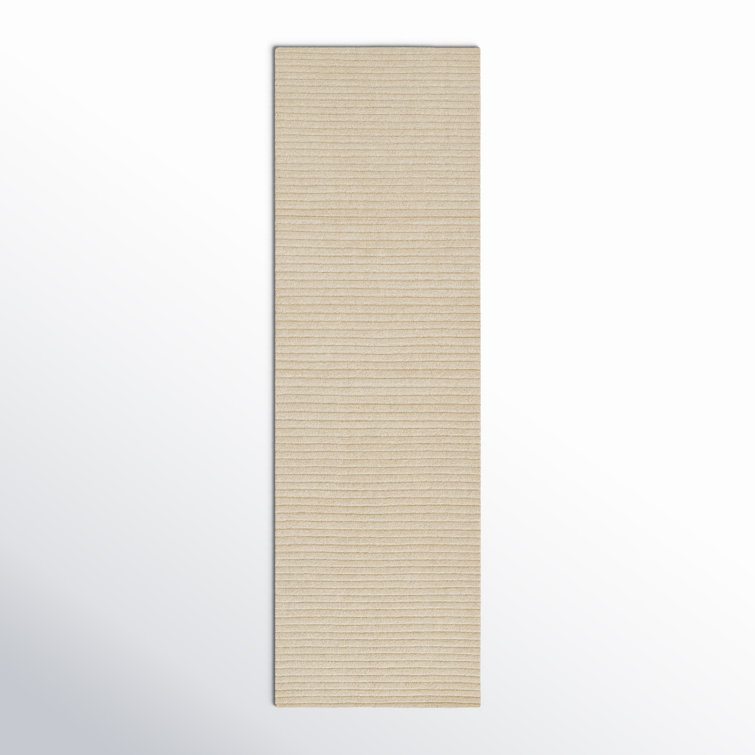 Guiness Solid Color Hand Loomed Wool Area Rug in Beige