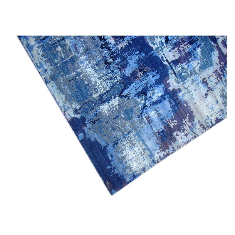 Tapis bleu de haute qualité noué à la main