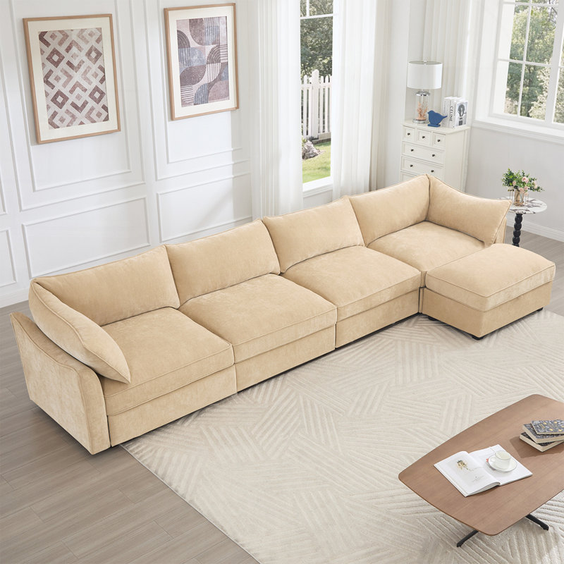 Luxueux canapé rembourré en chenille avec rangement intégré et design élégant, parfait pour les intérieurs modernes et nordiques