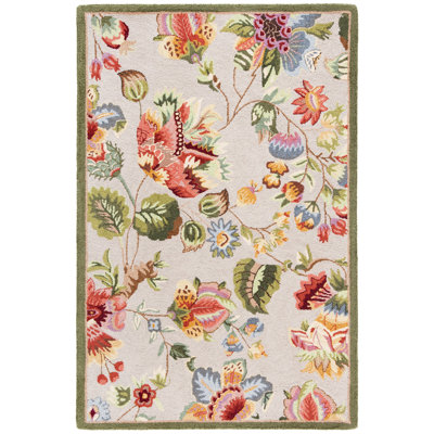 Tapis sauge en laine à motif floral Hollander