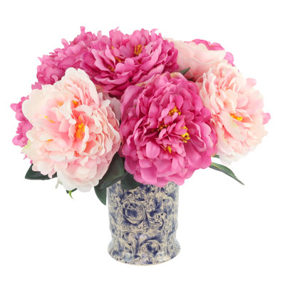 Pivoine disposée dans un vase en céramique