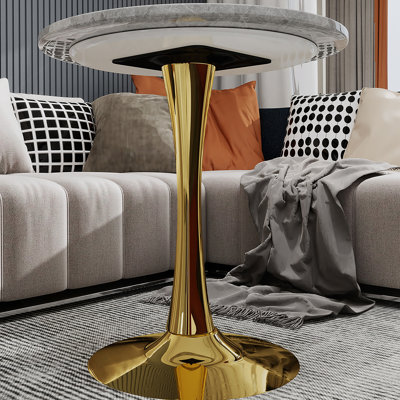Table d'appoint ronde à plateau en marbre avec base piédestal conique, idéale pour le salon, design minimaliste moderne