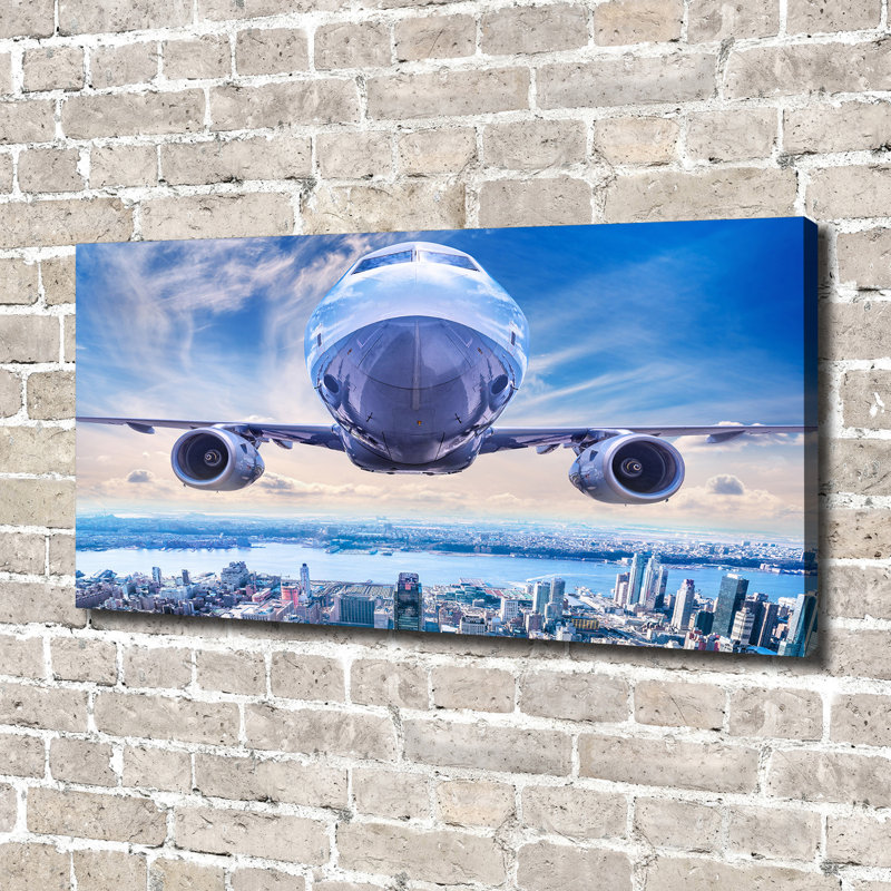 Plane Over The City - Wrapped Canvas Print