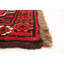 Tapis rouge en laine noué à la main