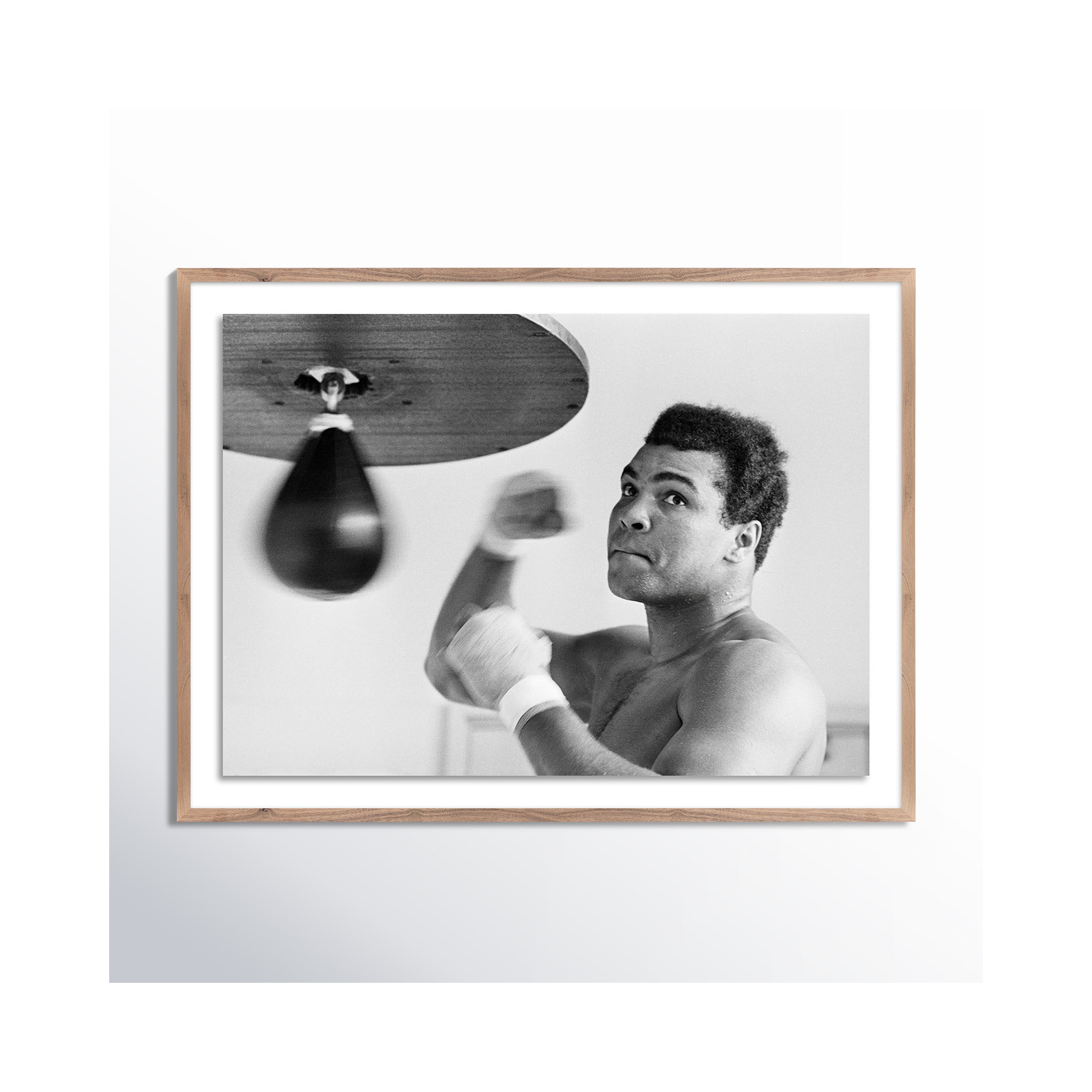 Muhammad Ali Punching Bag by Getty Images, Rustic Walnut Framed, 18" H x 24" W