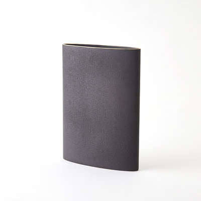 Vase Tuba noir avec rebord doré