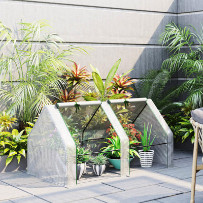 Mini serre portative de jardin extérieure 6 pi x 3 pi en blanc avec housse en PE hydrofuge et ventilation à fermeture à glissière