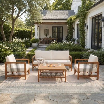 Ensemble de canapés de jardin en bois d'acacia durable avec accents de corde et coussins résistants à l'eau pour une détente optimale.