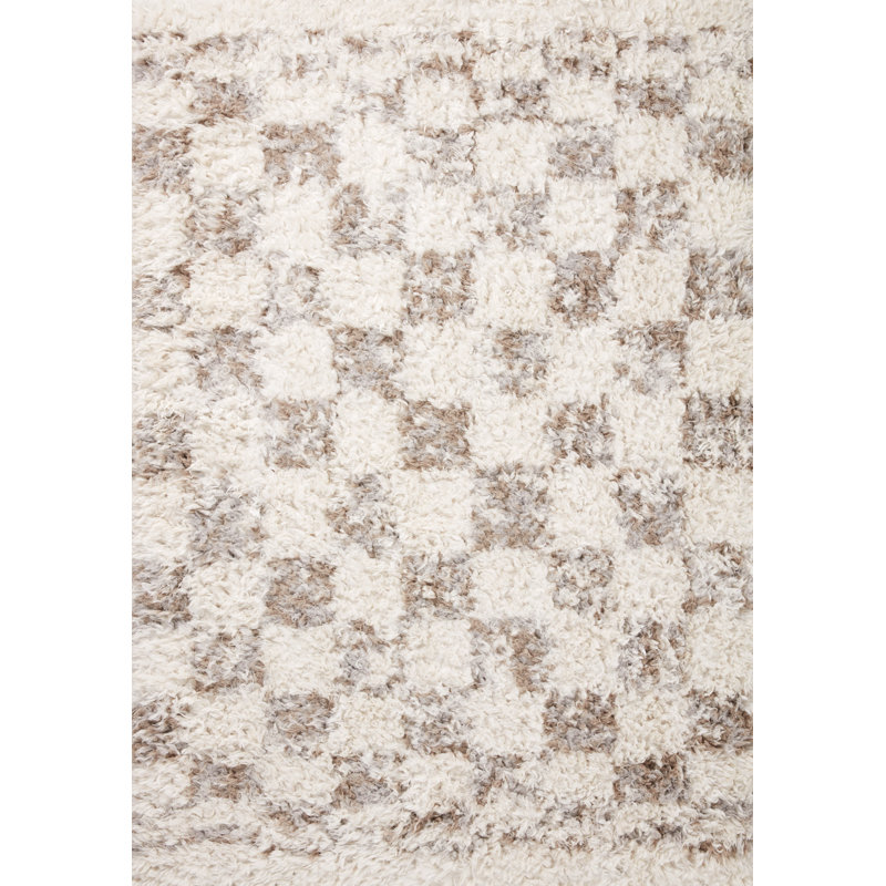 Ivory and Pebble Geometric Synthetic 7'-10" x 10' Area Rug
